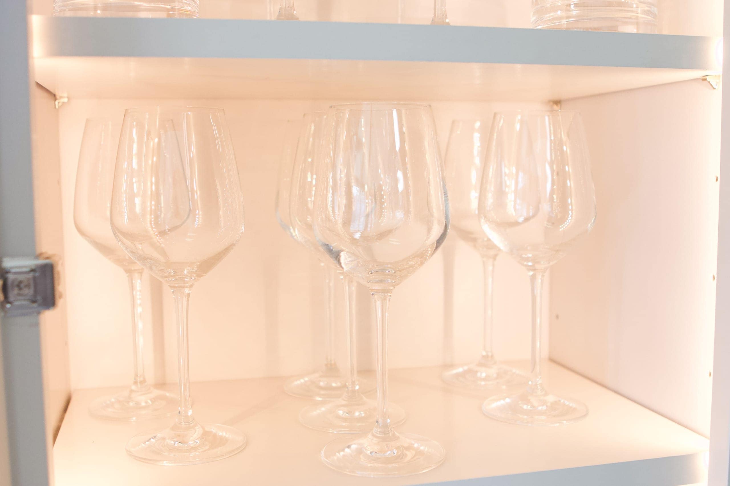 Wine glasses in cabinet