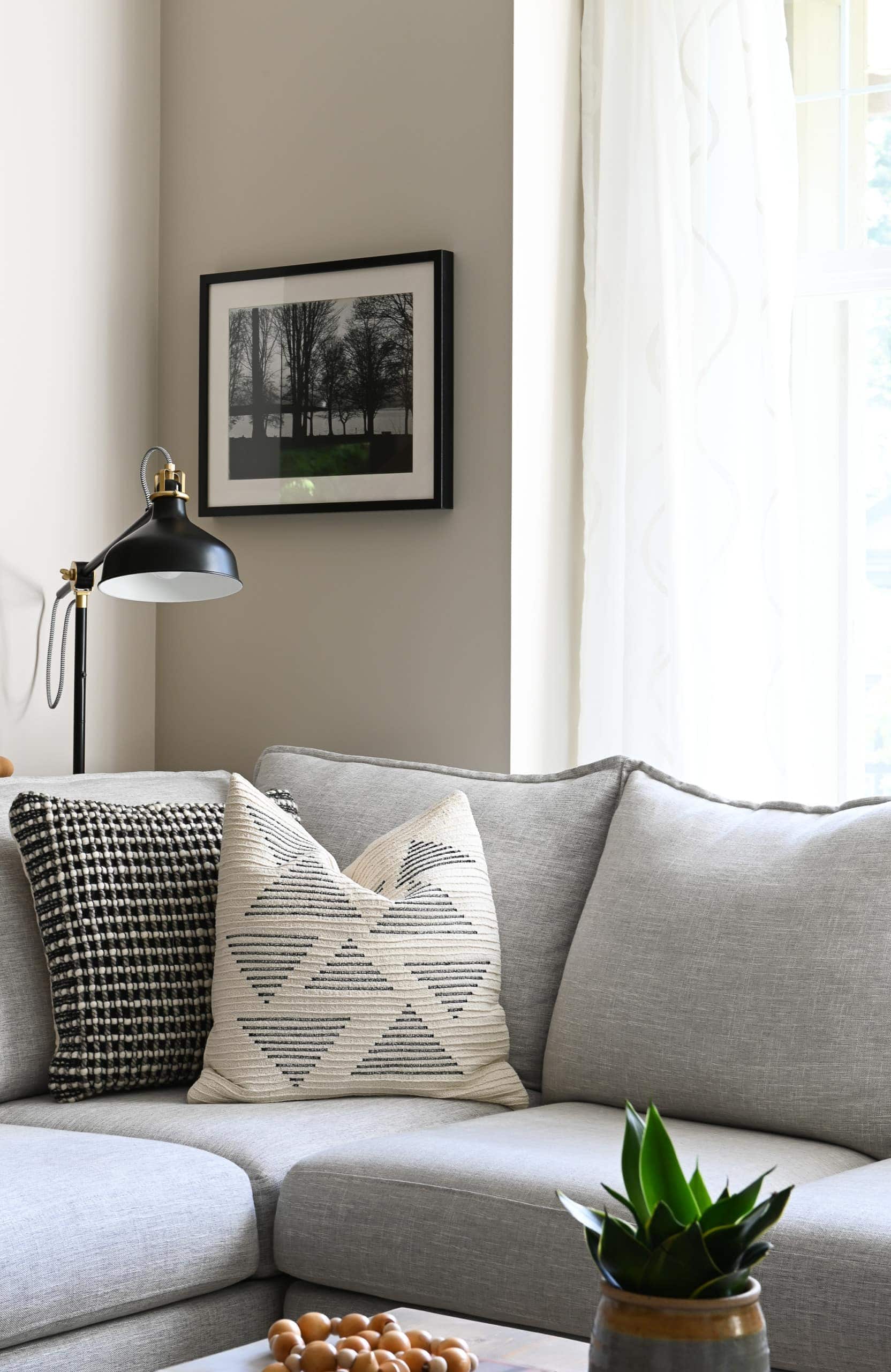 Comfy gray sectional in a DIY farmhouse style home