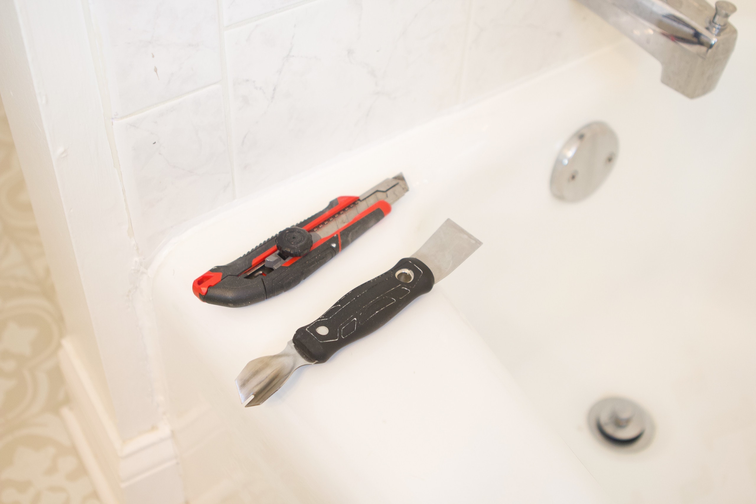 Remove the caulk before you paint your bathtub