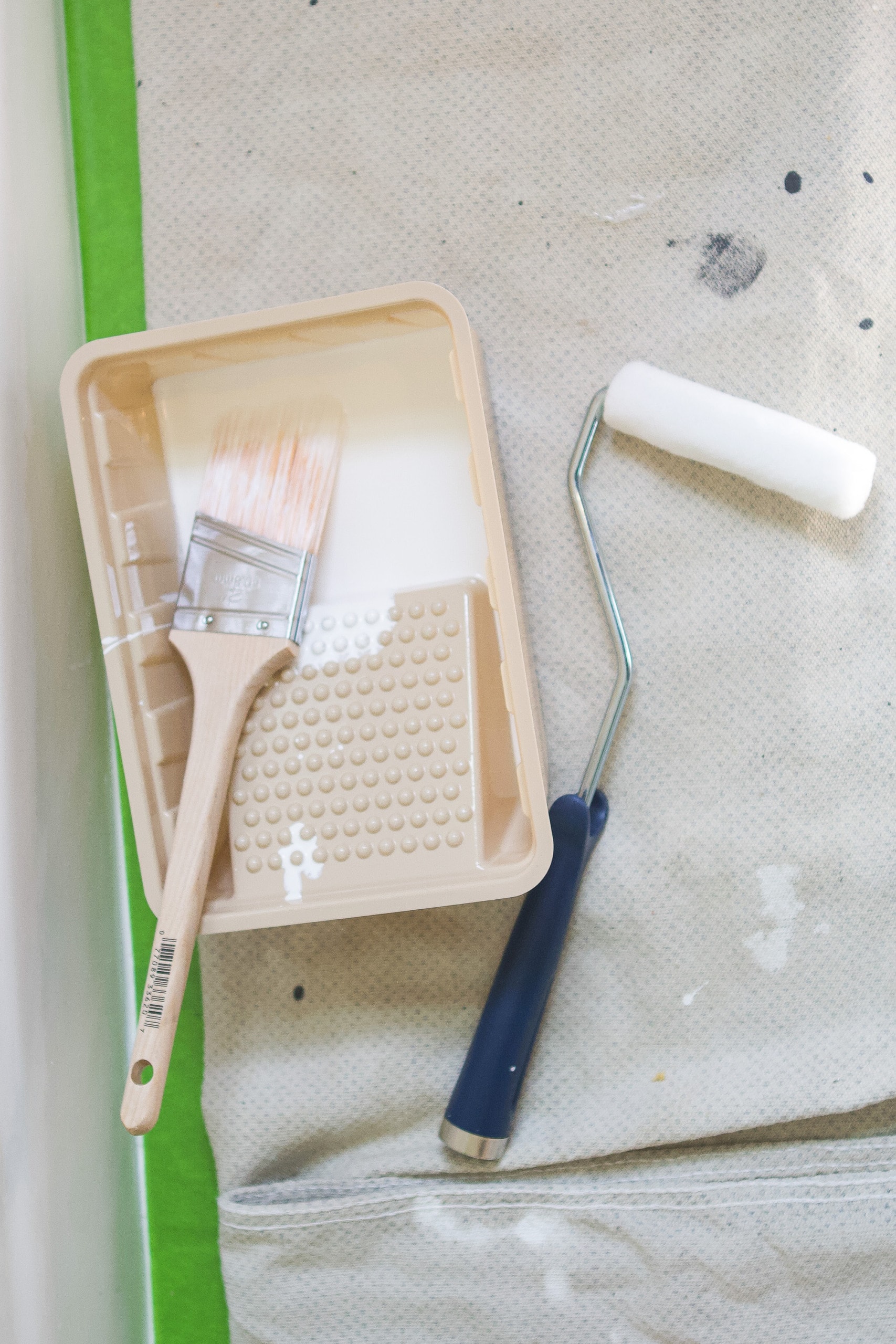 Use a paint brush and roller to paint your bathtub