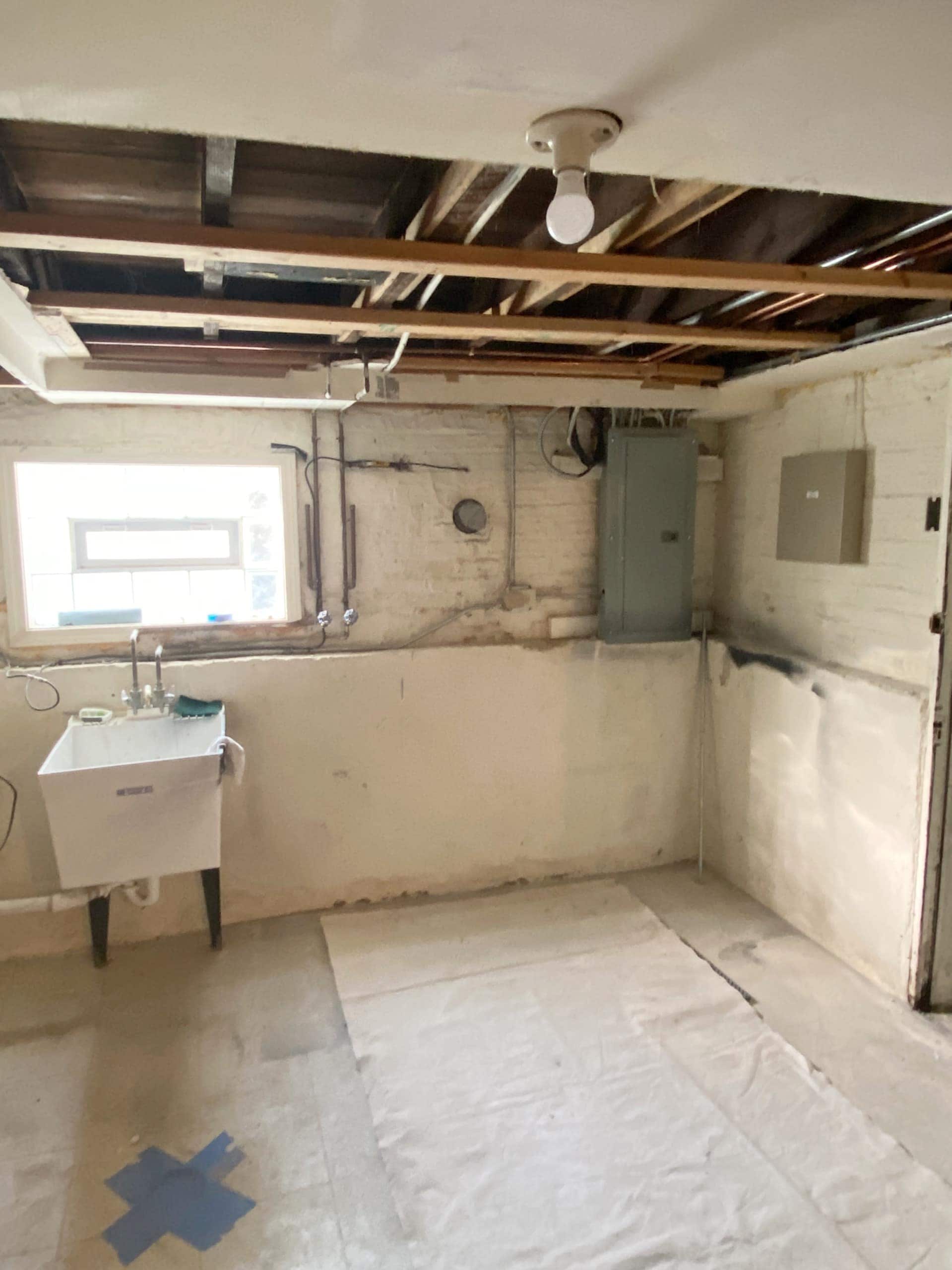 Removing the ceiling in the basement storage room