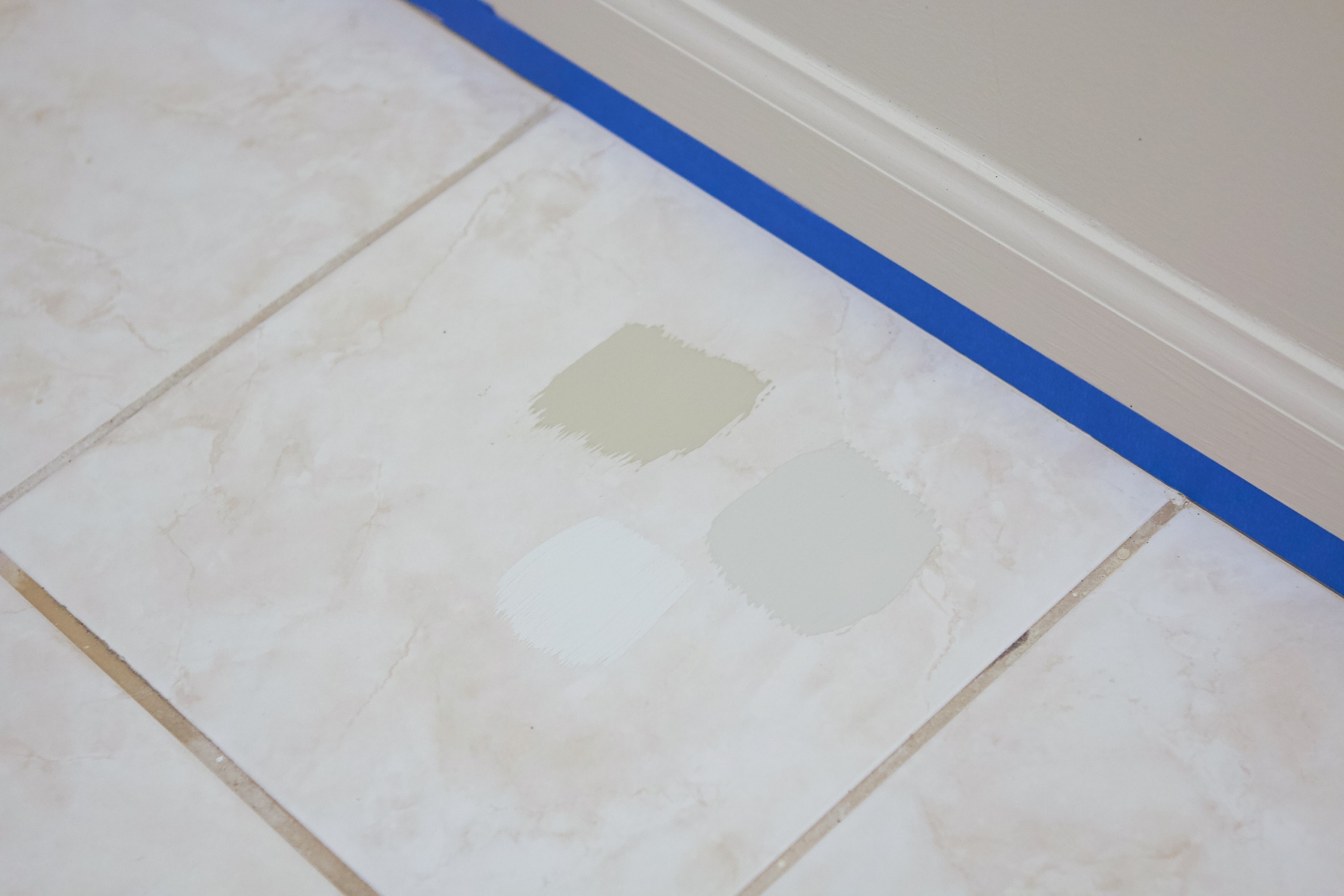 Try out the colors directly on the floor tile