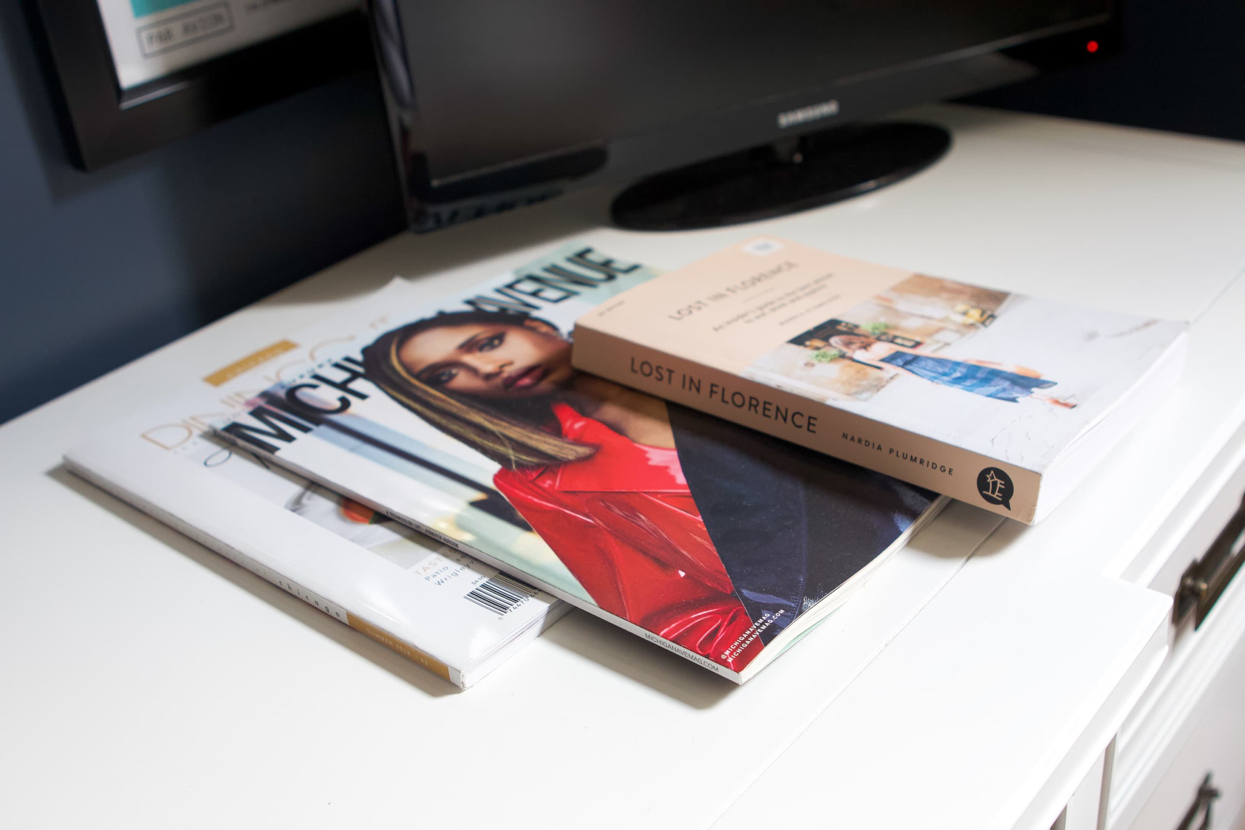 Magazines and a book in a cozy guest bedroom retreat