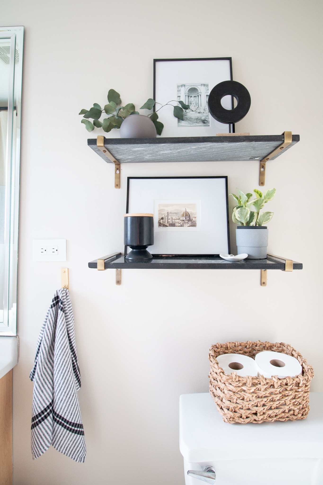 Add shelves over the bathroom toilet