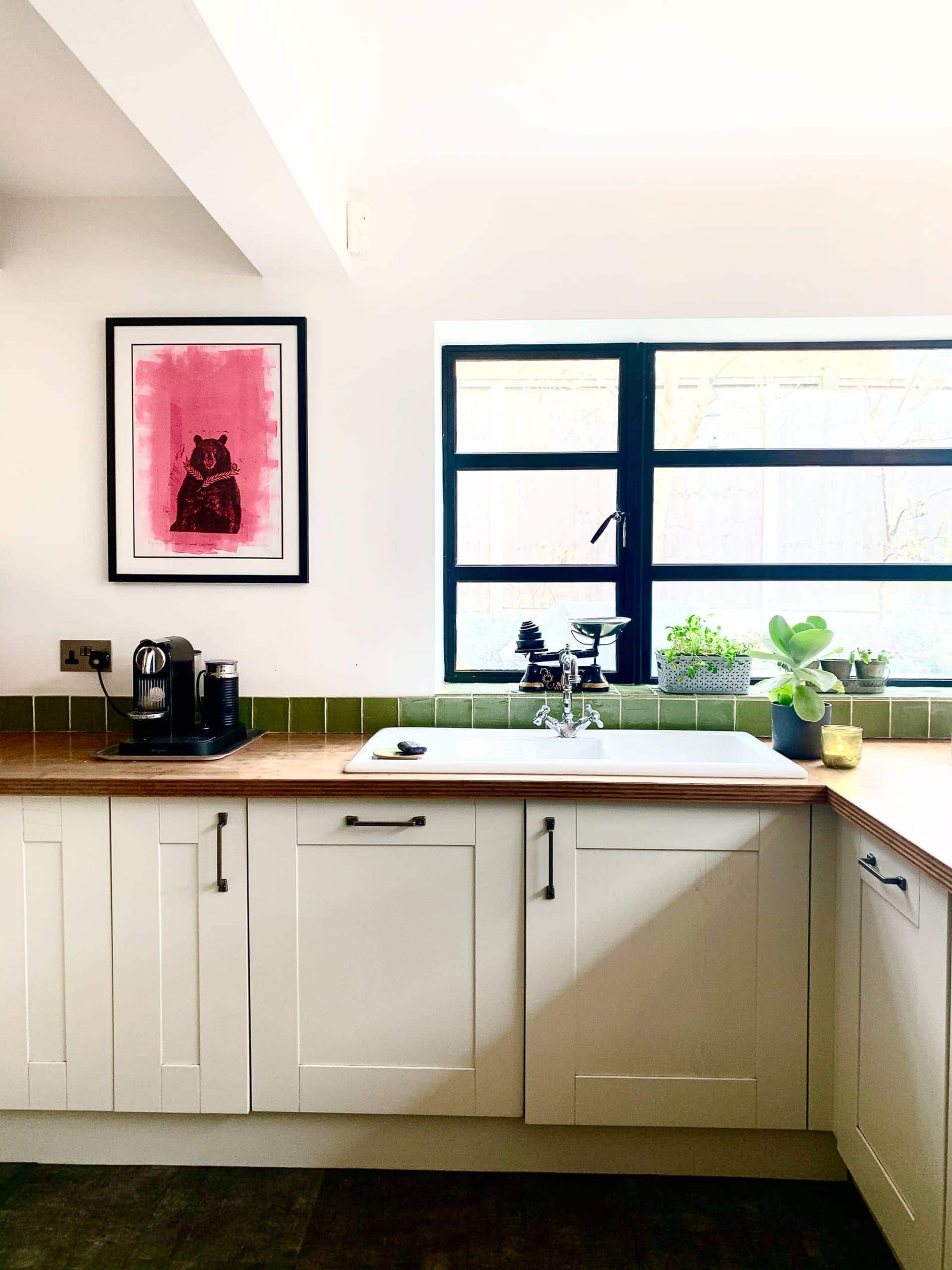 White kitchen with black windows