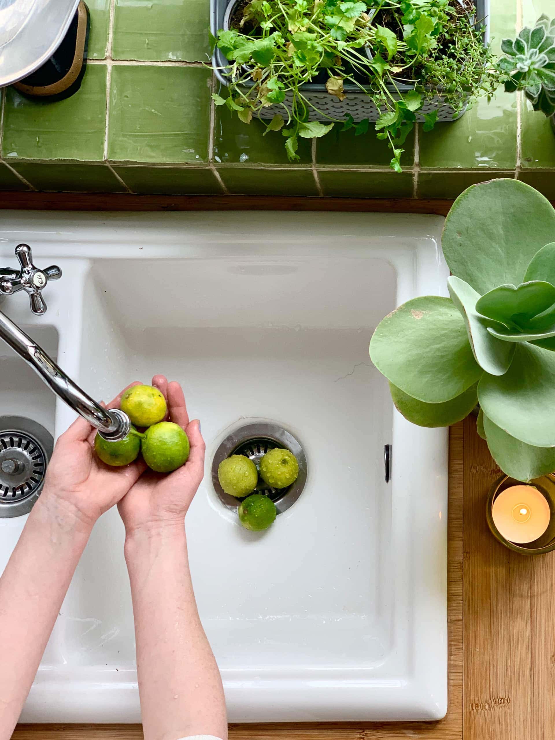 Washing fruit in the sink