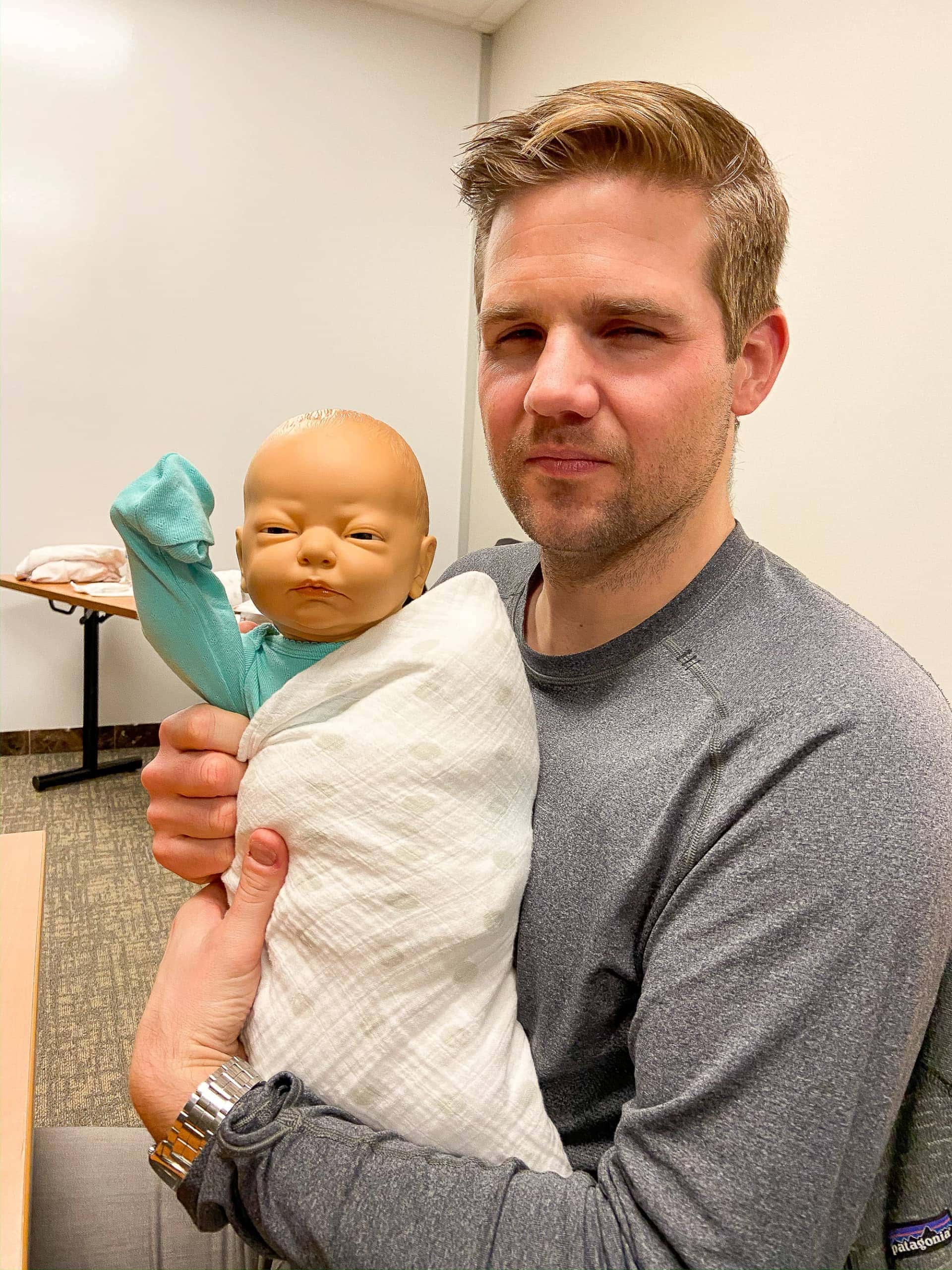 finn and doll in newborn class