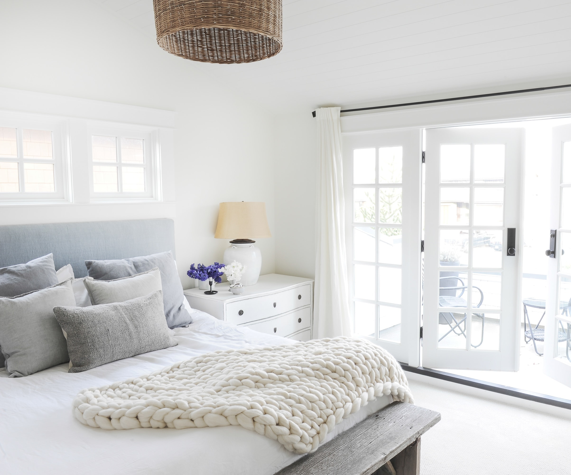 White bedding in this master bedroom oasis