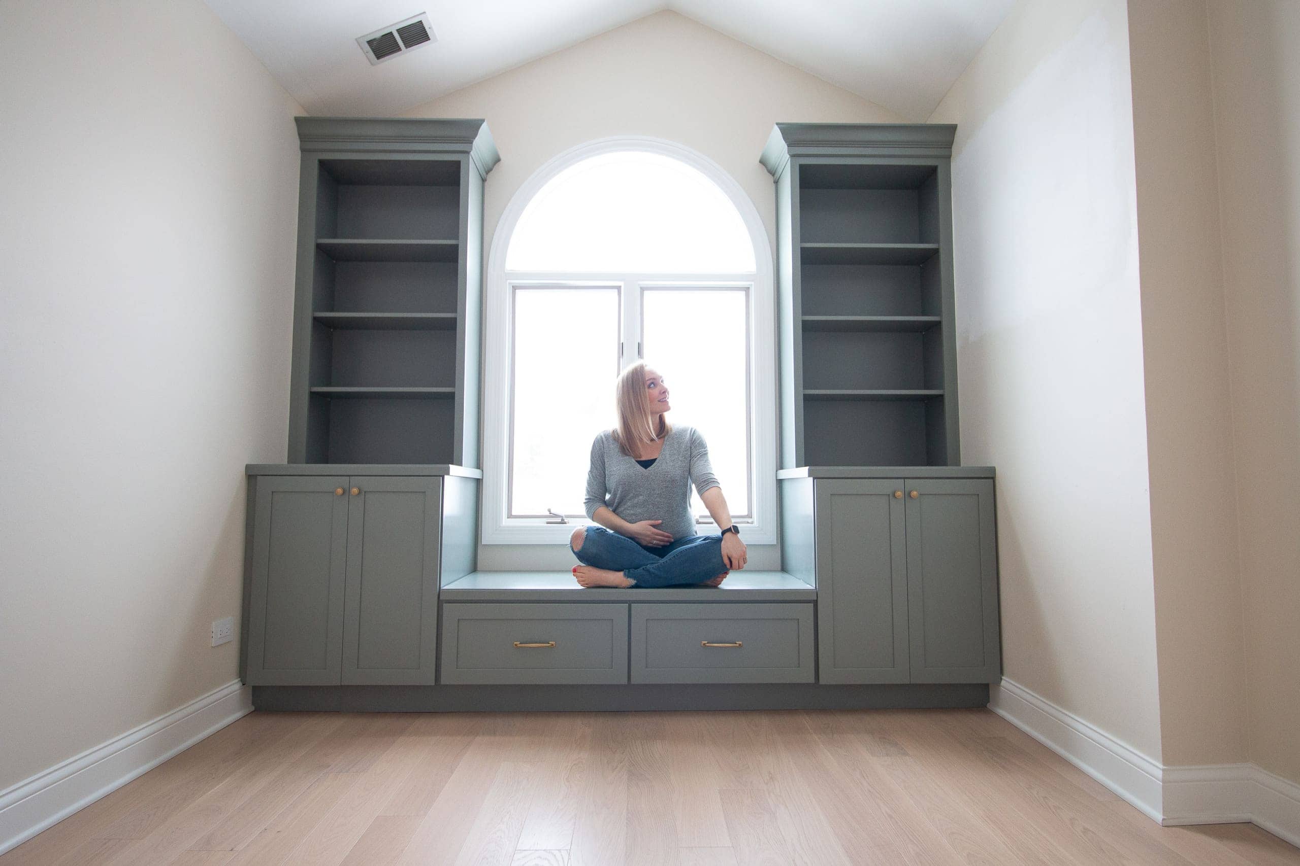 Our sage green nursery built-ins from Lowe's