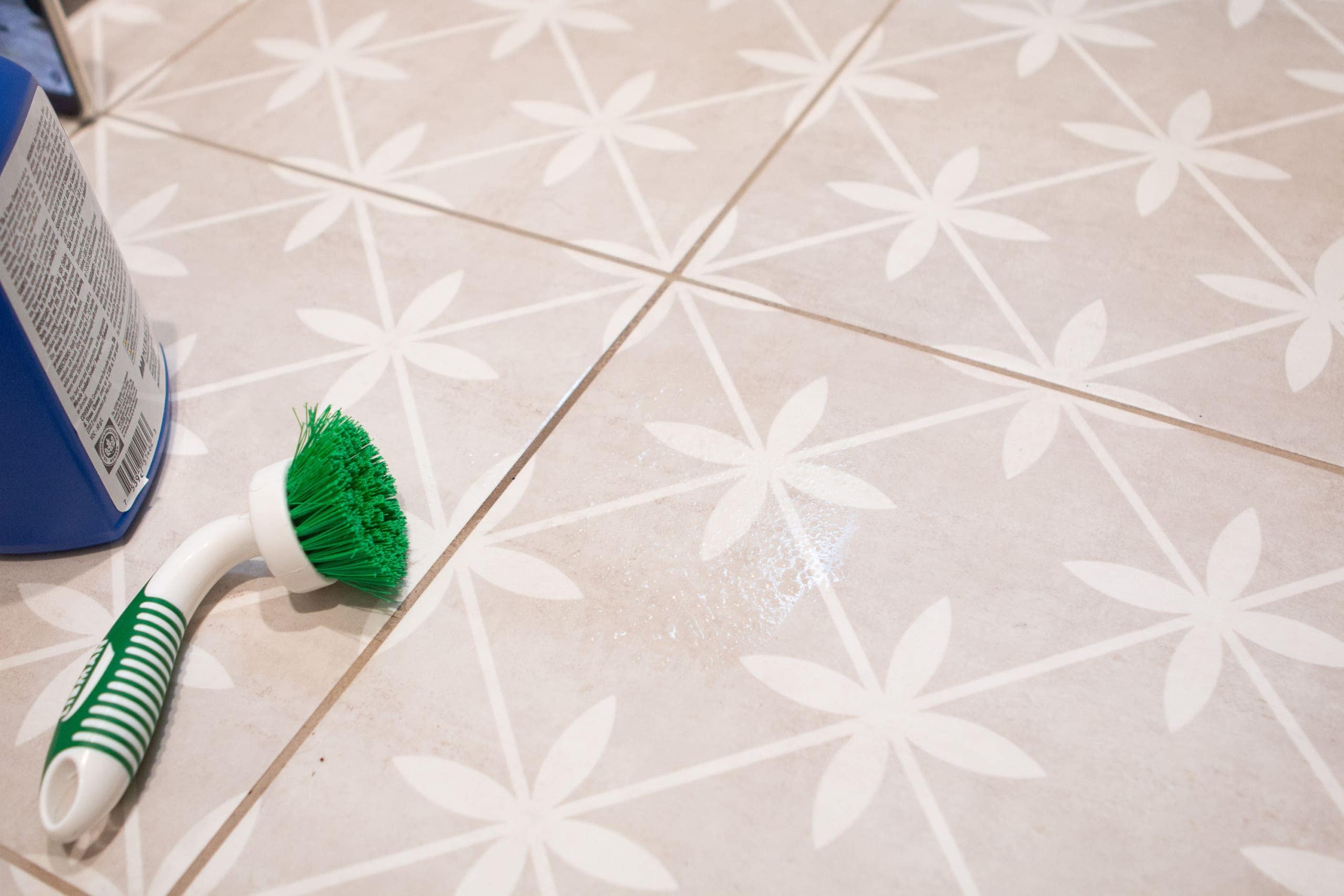 Use a brush to agitate the cleaning solution