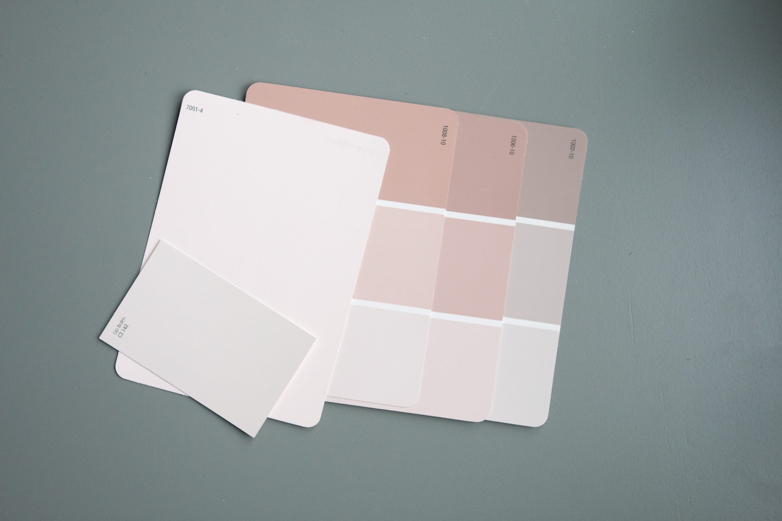 Looking at paint swatches to choose a paint color