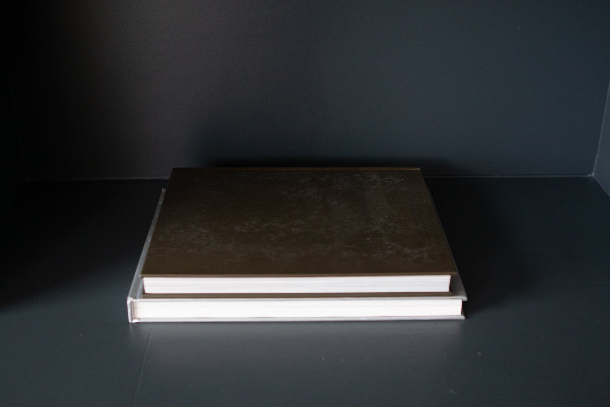 Use coffee table books to ground surfaces