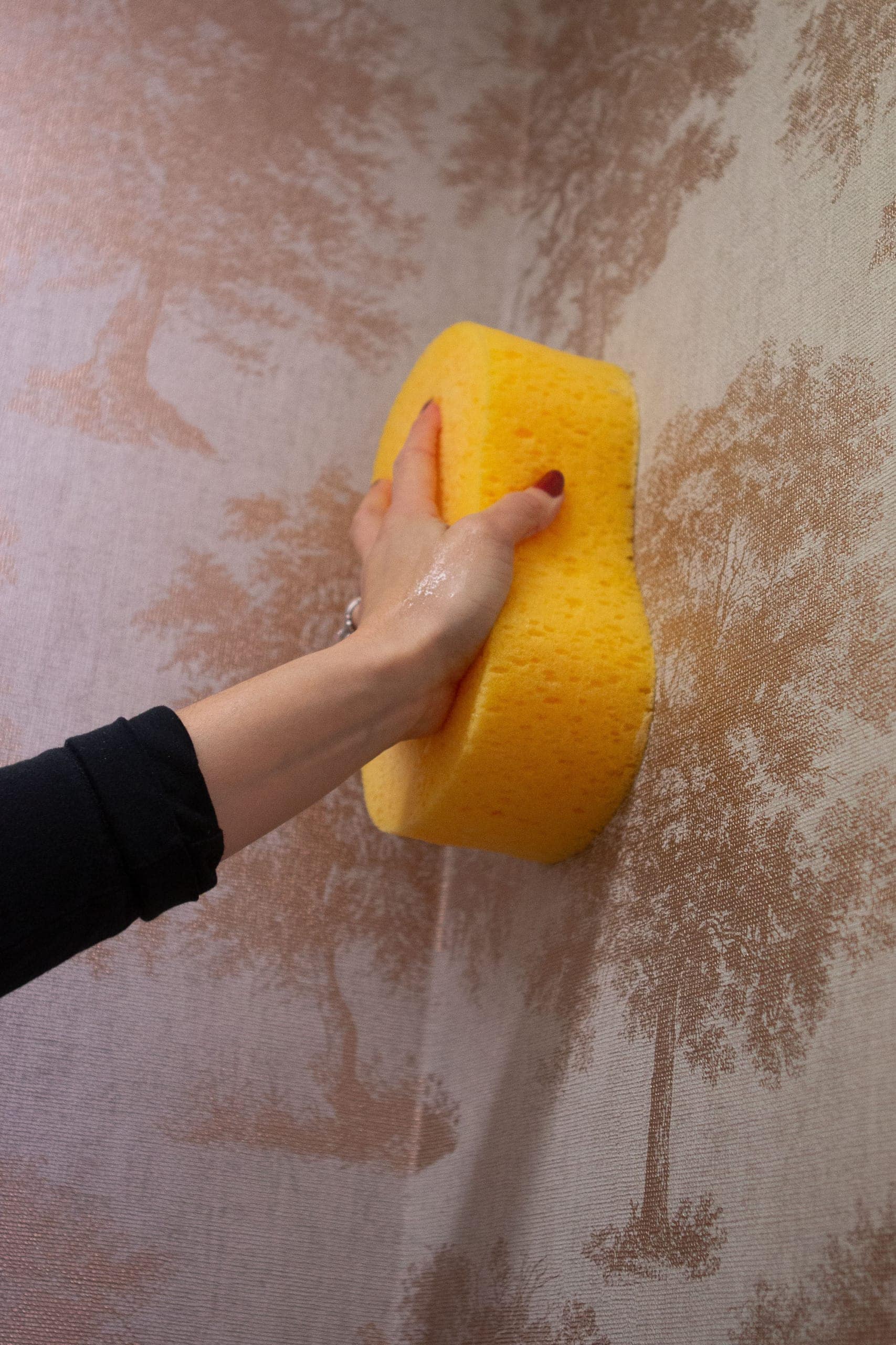 Use a sponge to get rid of excess paste