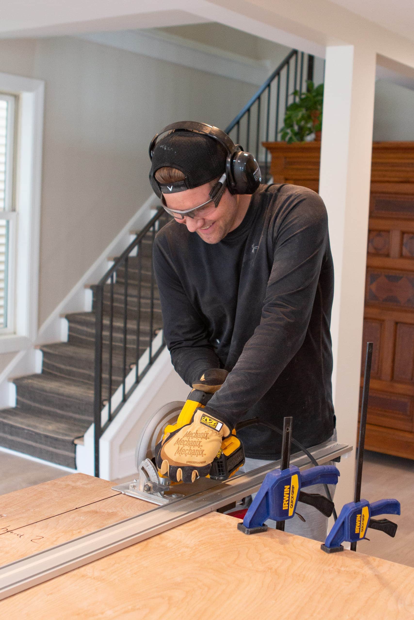 Finn using a circular saw for cuts