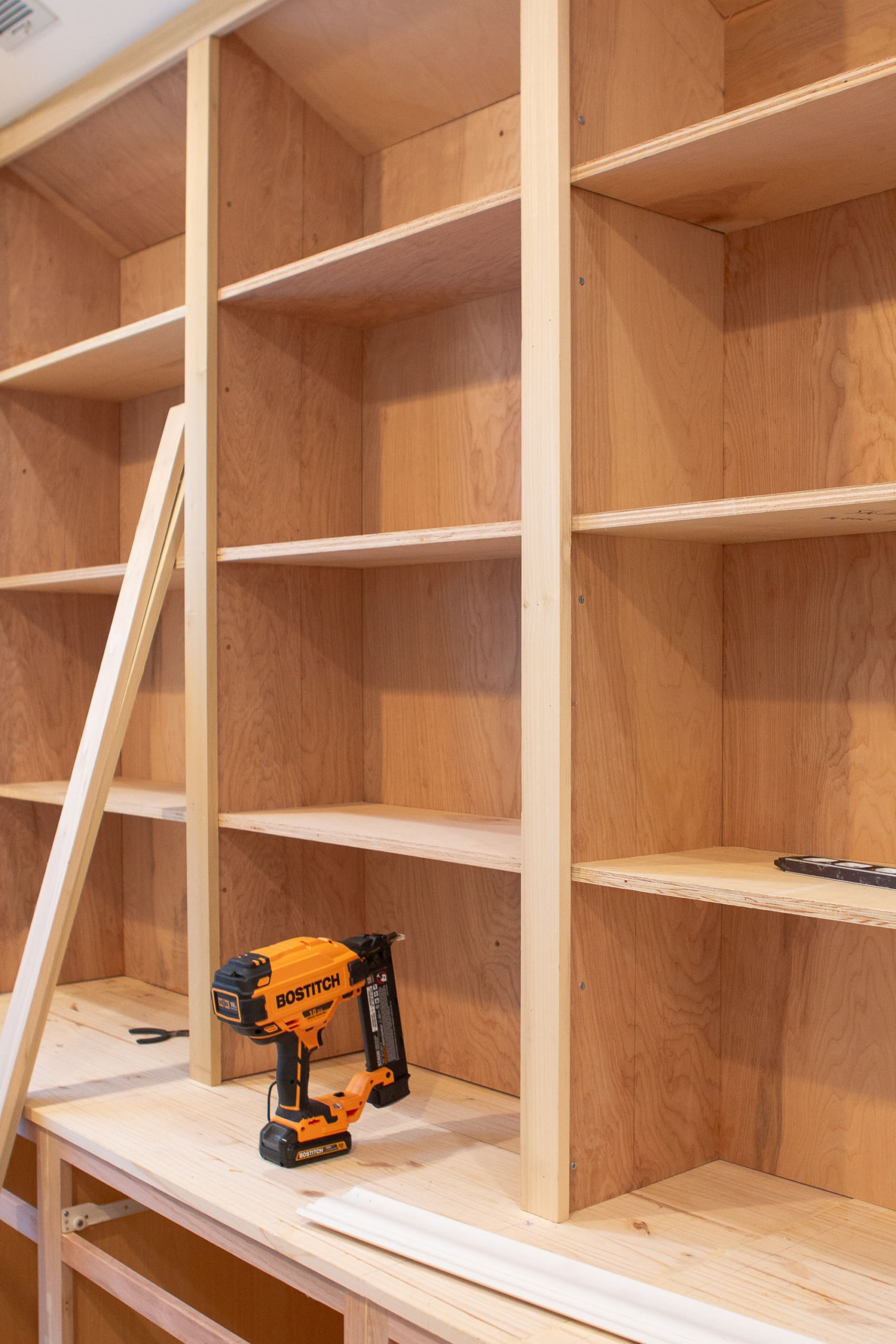 Adding poplar to the DIY bookshelves