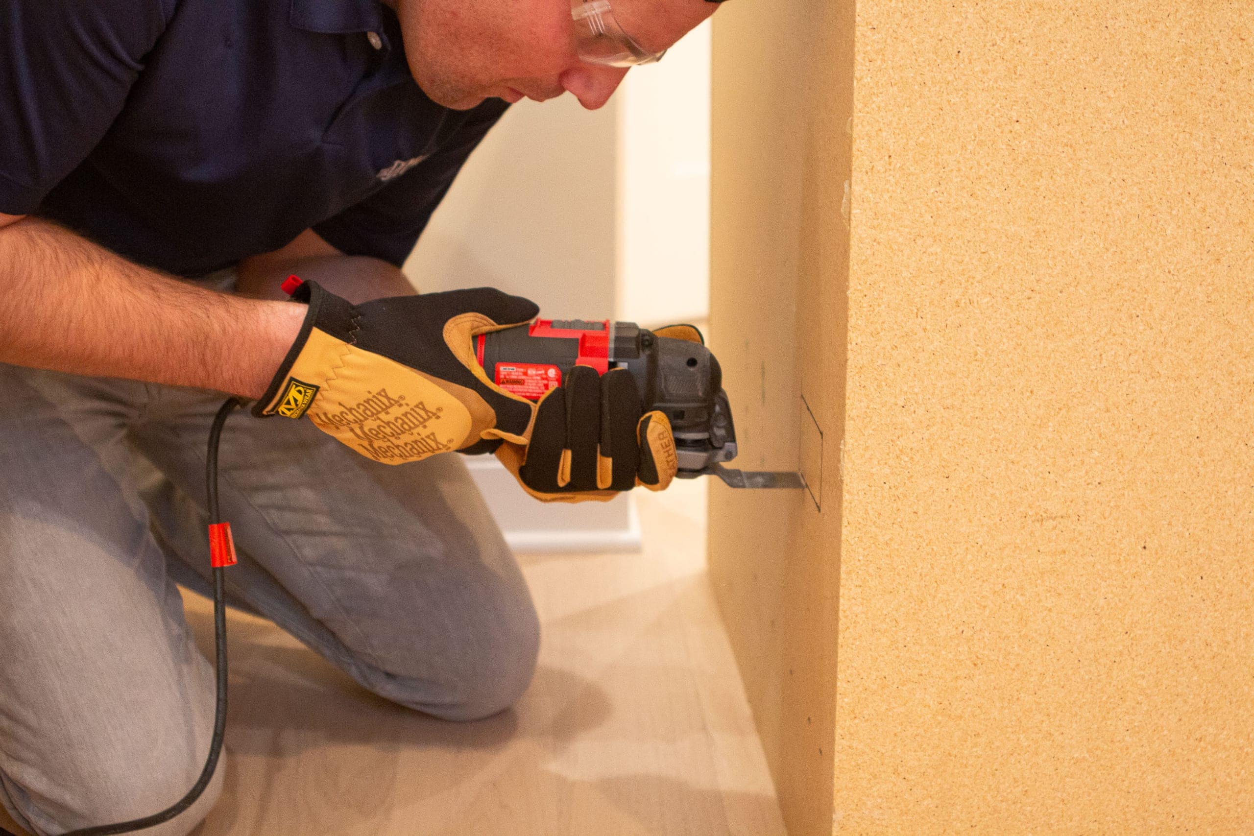 Cut outlets in the back of the cabinet