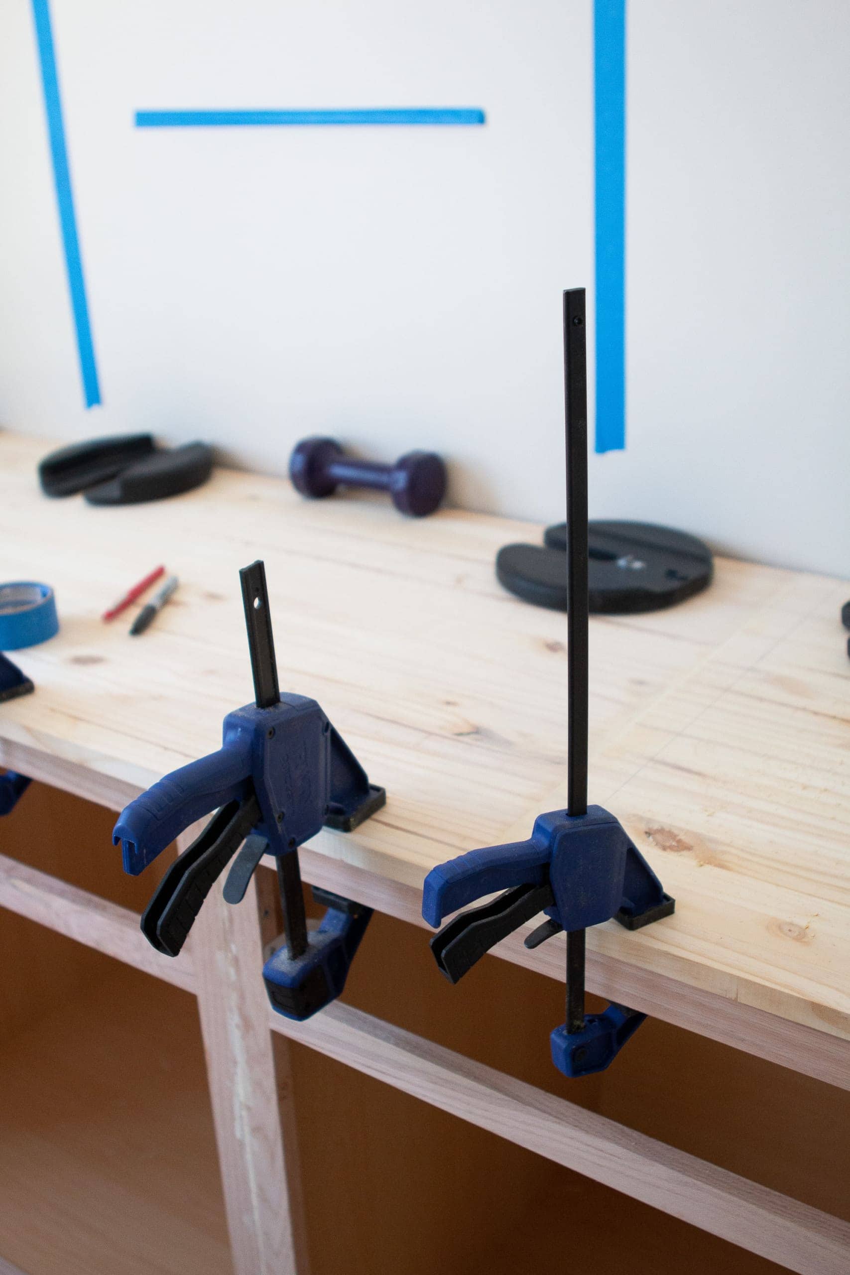 Using clamps to hold the countertop on