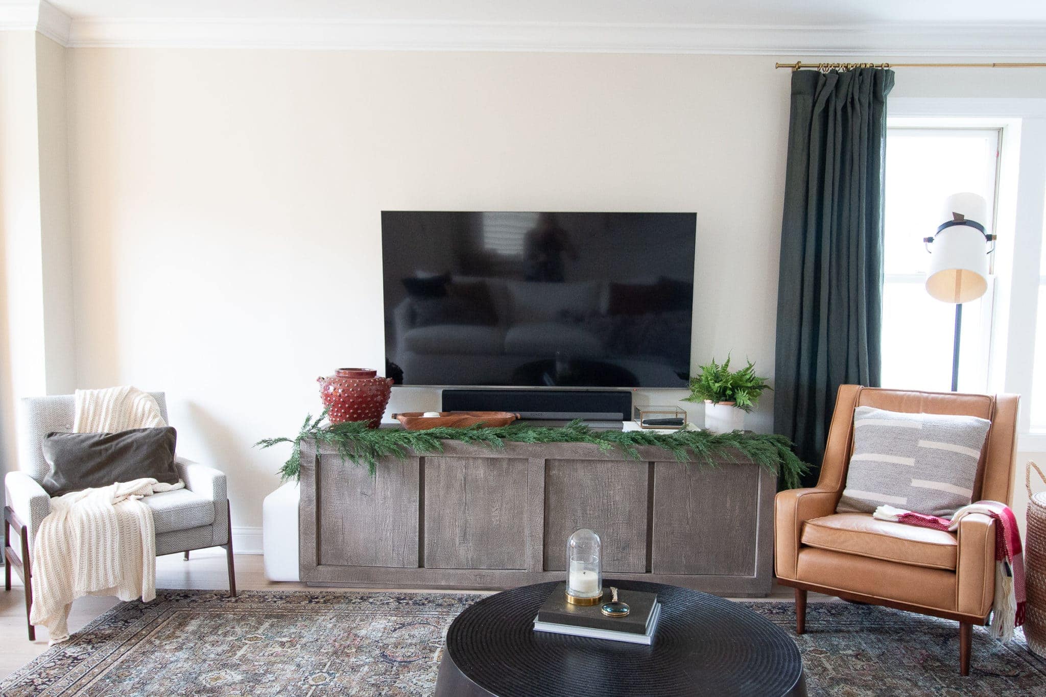 Our TV console with faux garland