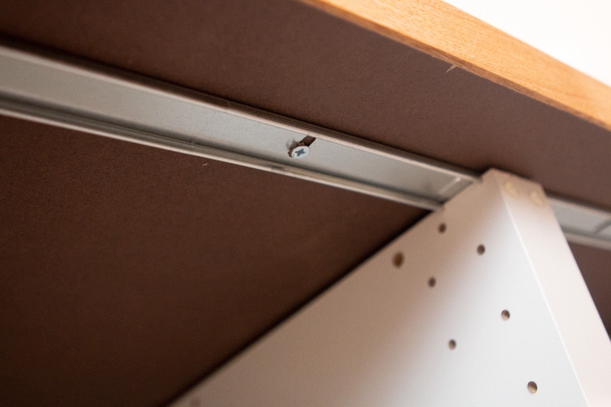 Screwing butcher block into cabinets