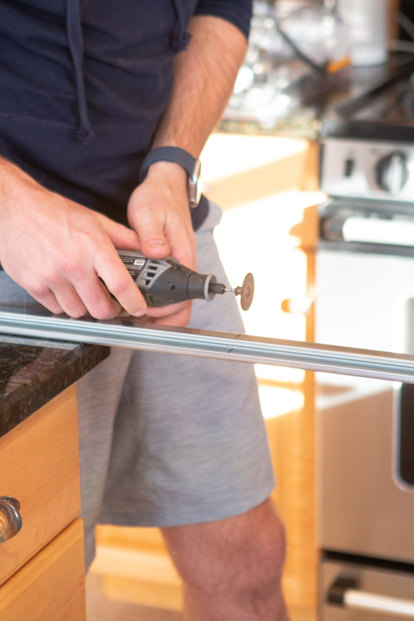 Using a metal dremel bit to cut metal rail on IKEA