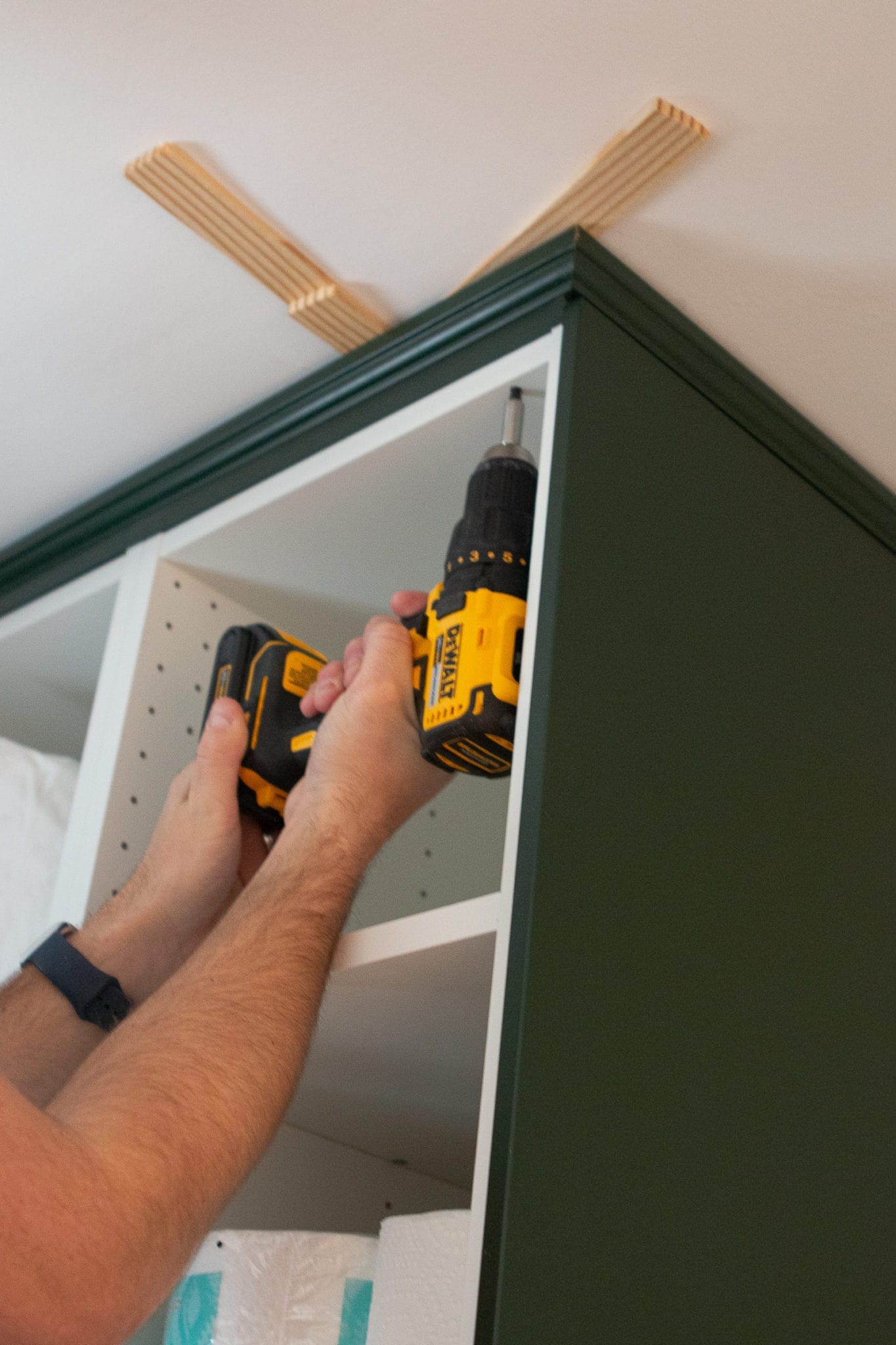 Adding crown molding to the ceiling