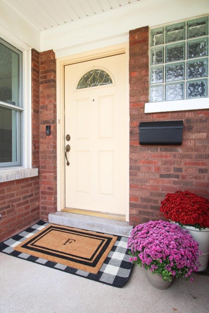 Fall decorating on the front porch