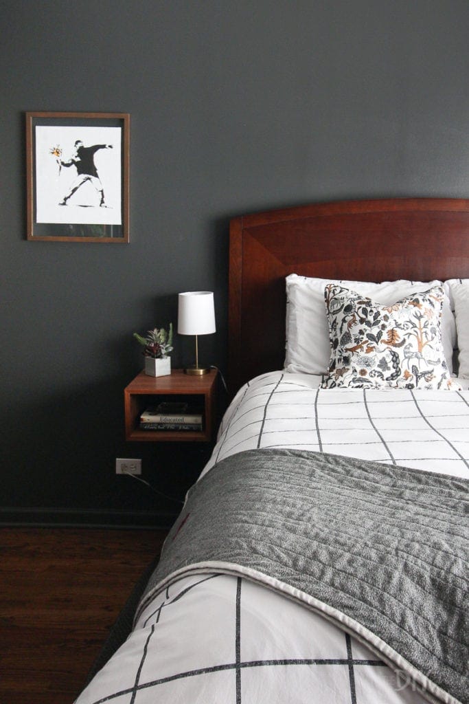 Black walls in a master bedroom