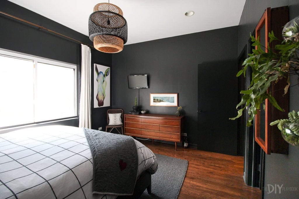 Black walls in a master bedroom