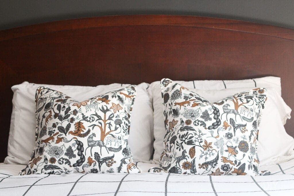 Patterned pillows on a bed