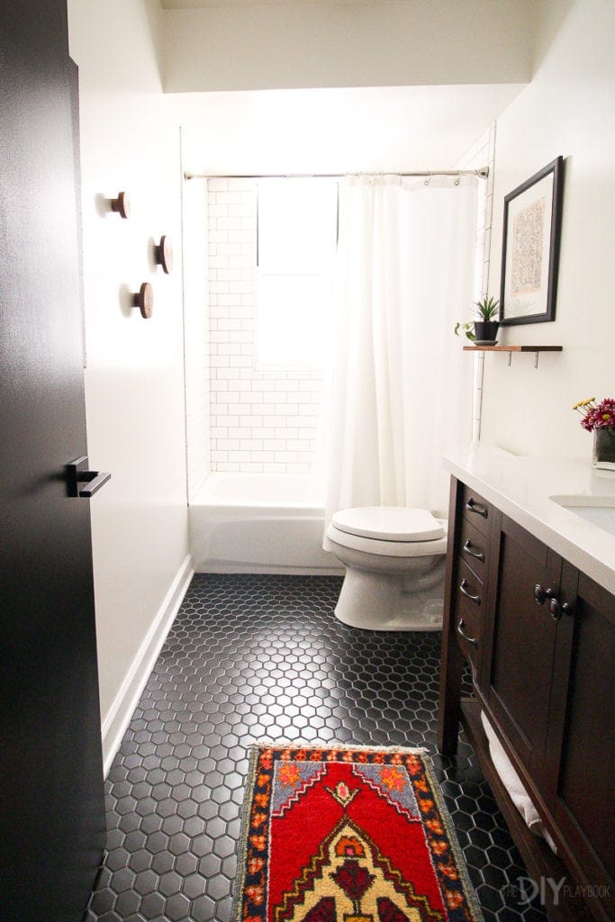 Bathroom with black hexagon flooring