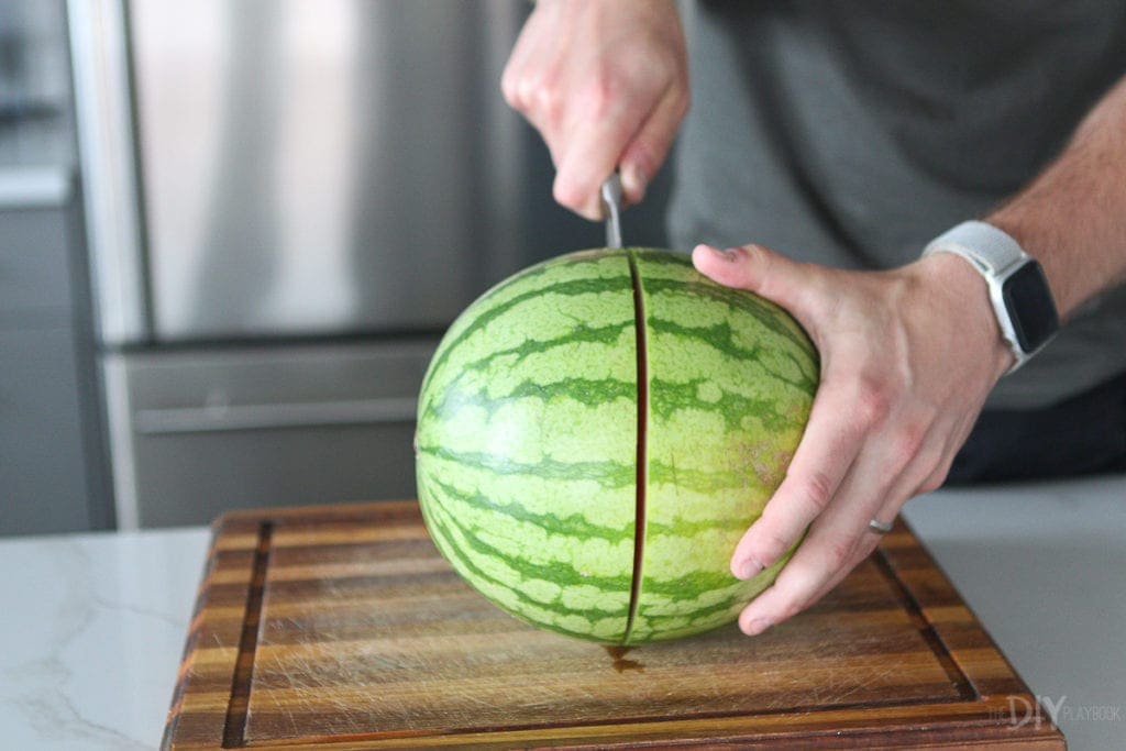 Cut the watermelon in half