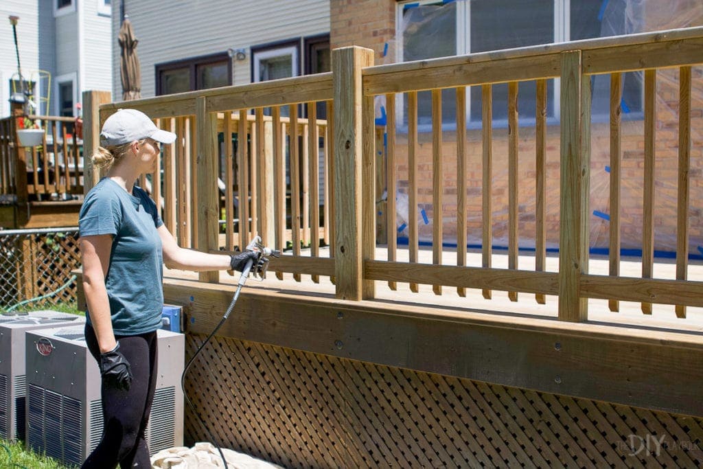 Spraying the spindles with a paint sprayer