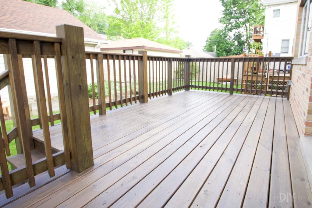 The deck after staining with a paint sprayer