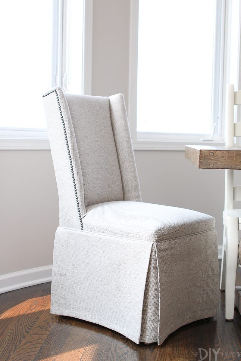 Comfortable chairs at the head of a dining room table