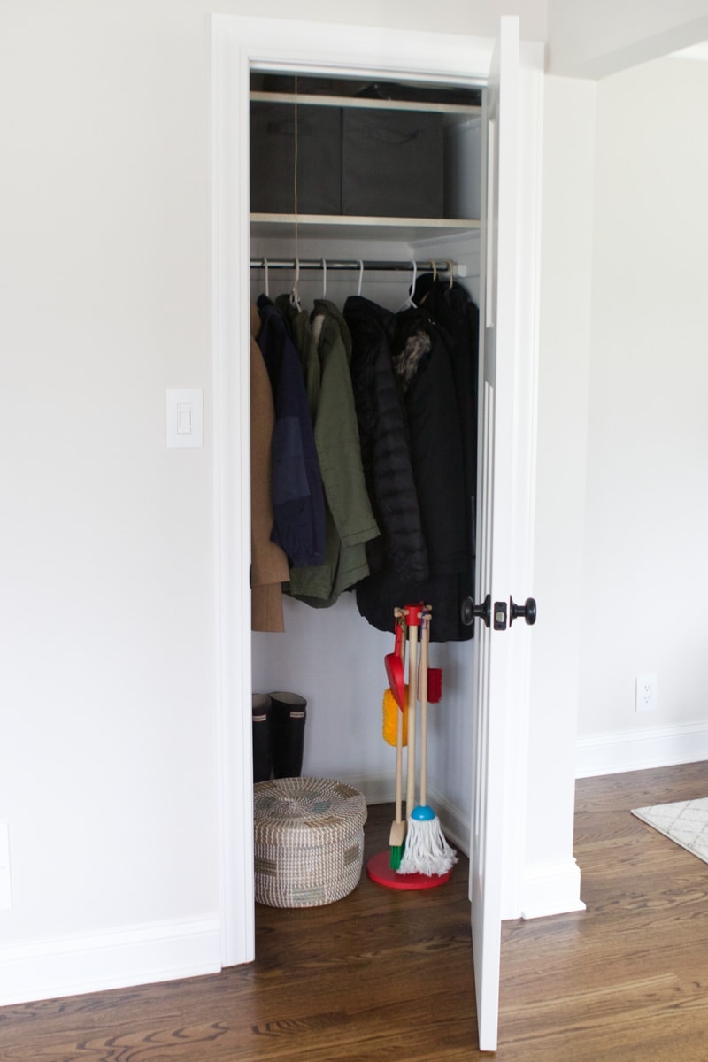 coat closet with a hidden vacuum