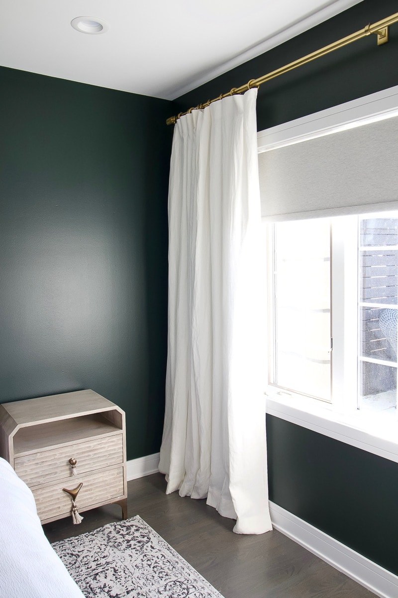 How to hang curtains in a bedroom space