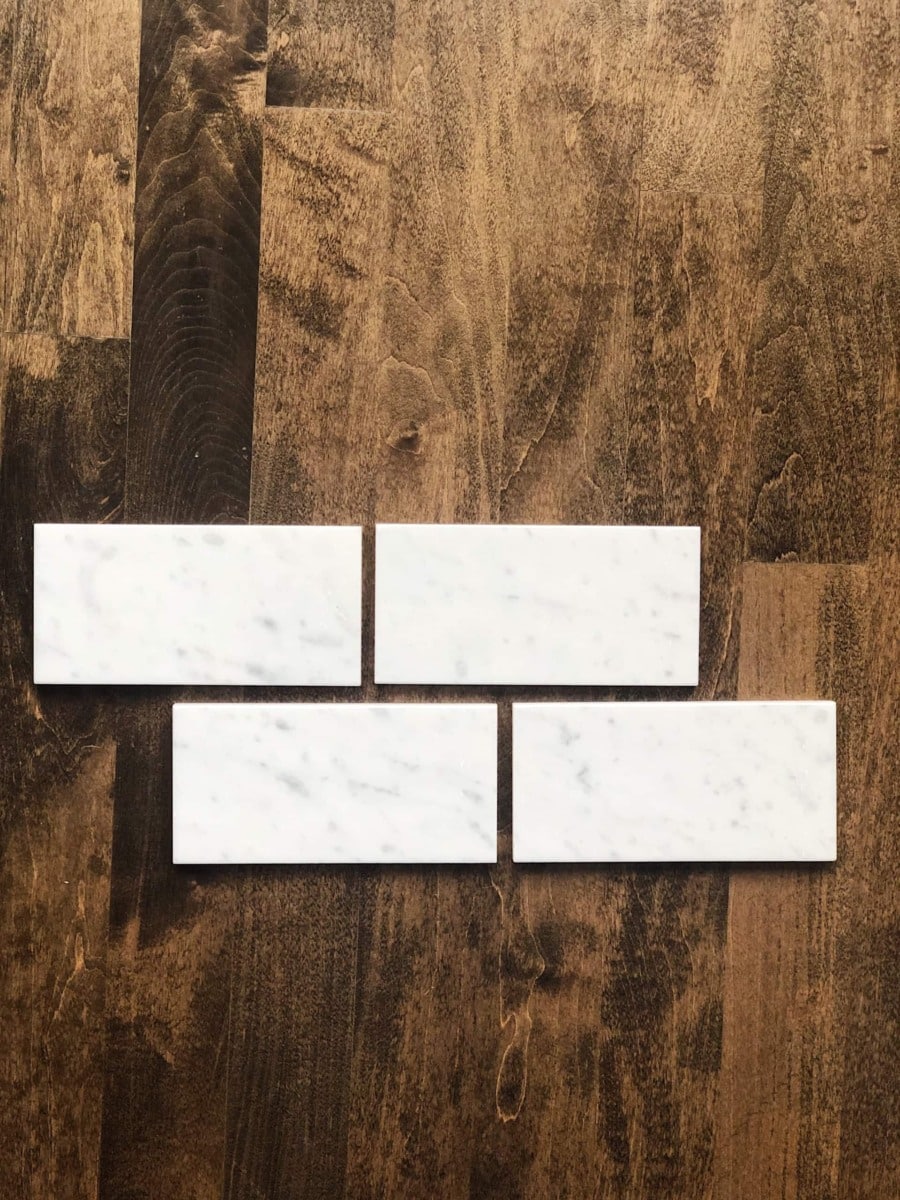 Marble subway tile for fireplace makeover