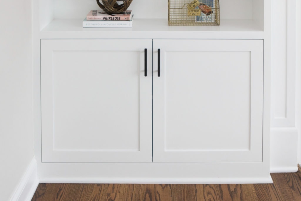 white cabinets with hidden childproofing