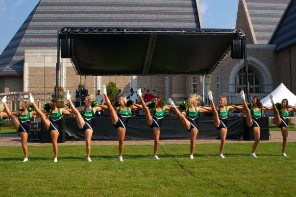 Notre Dame dancer kick line