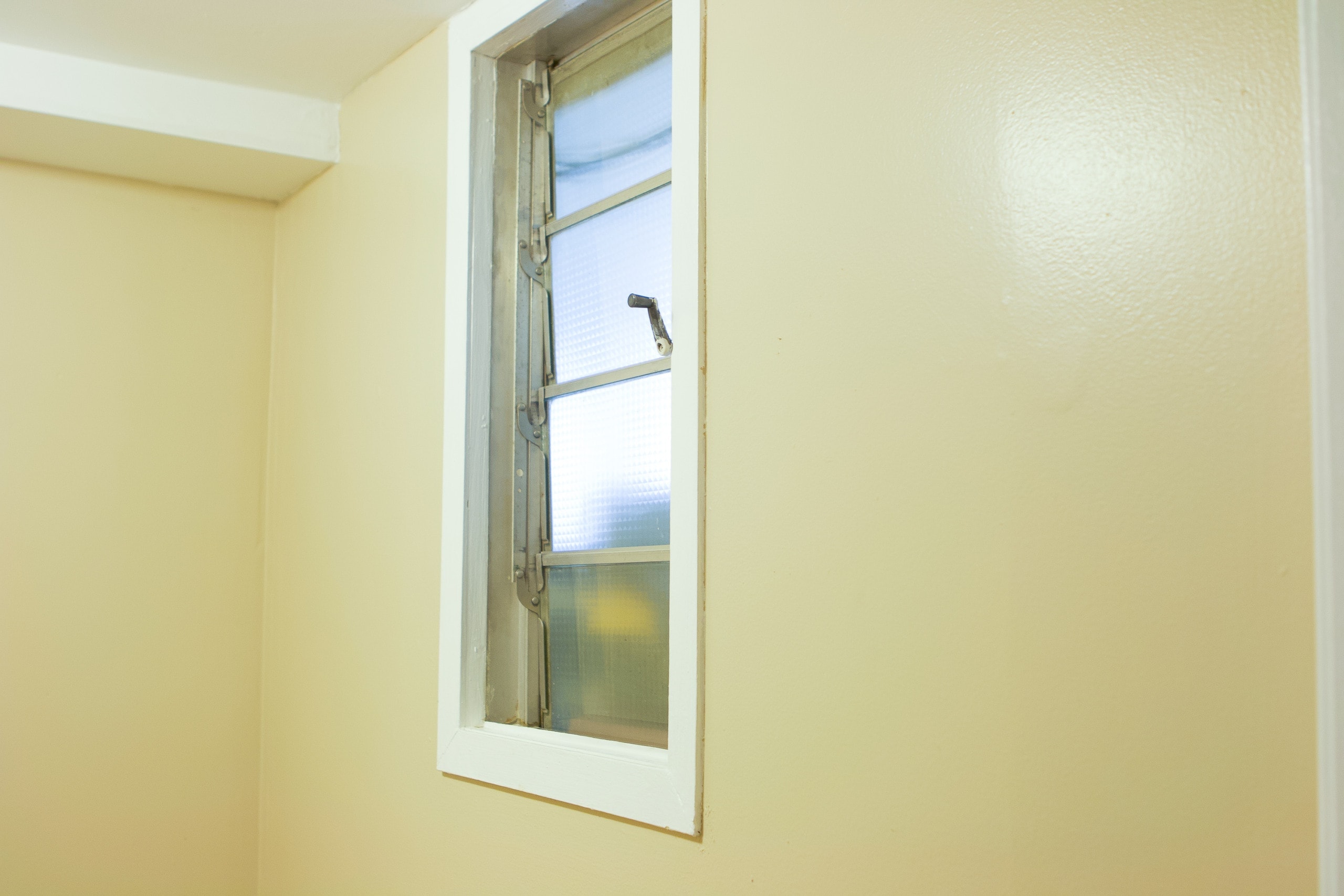 The window to nowhere in the basement bathroom