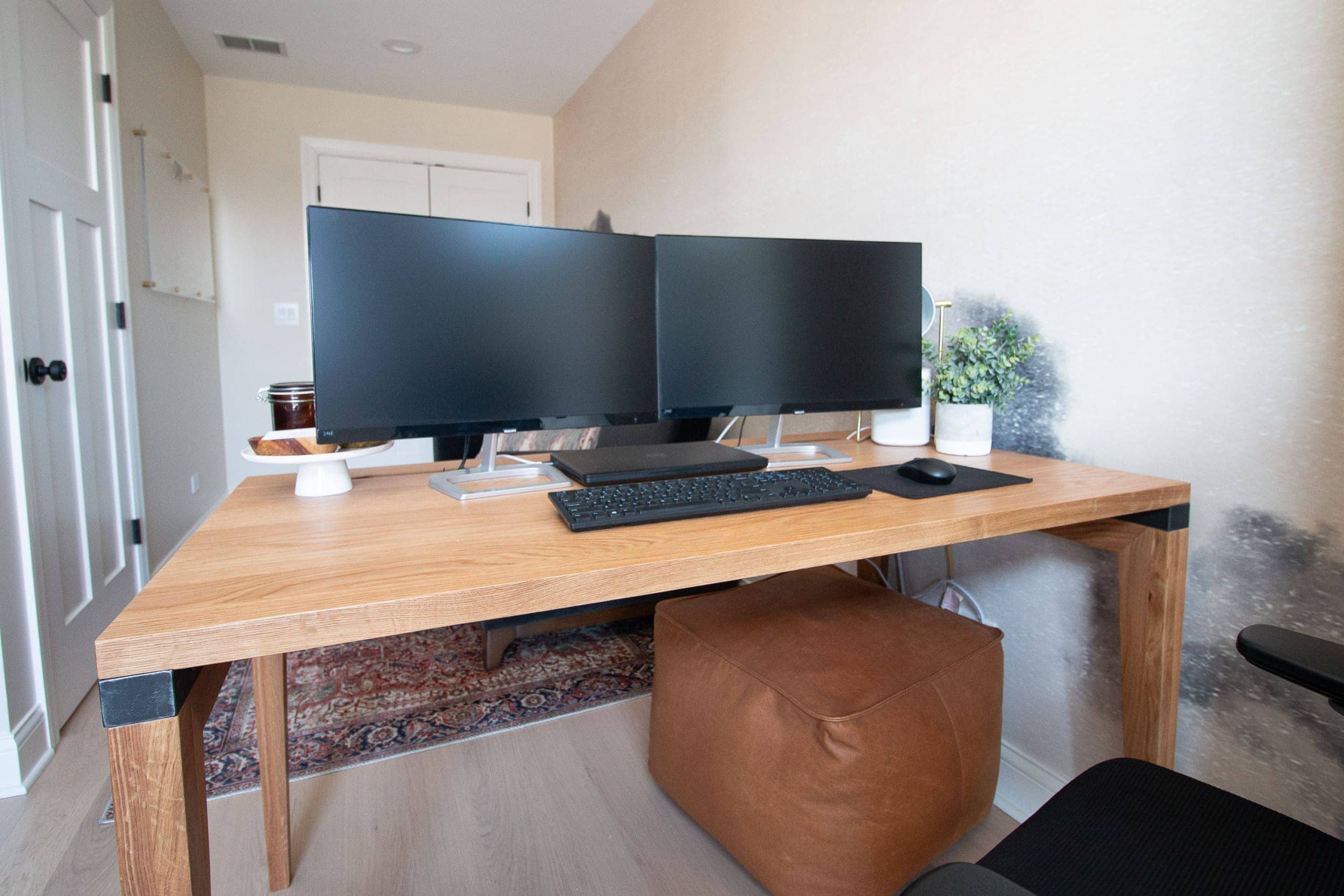 Two desktop monitors that are sleek and perfect for your work from home office