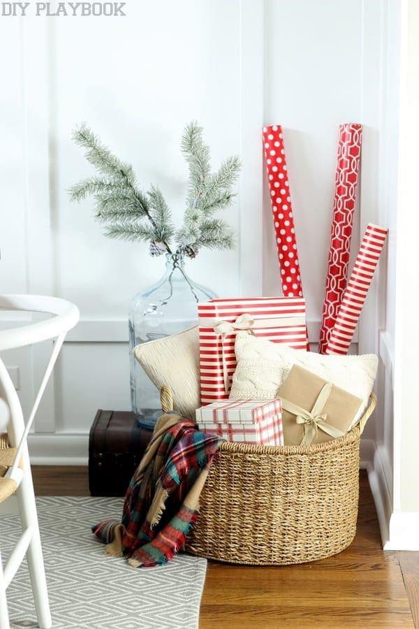 basket of gifts on a fireplace a mantel