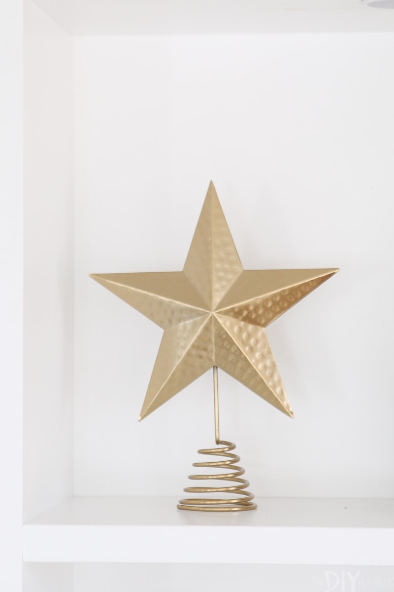 Gold tree topper as holiday decor
