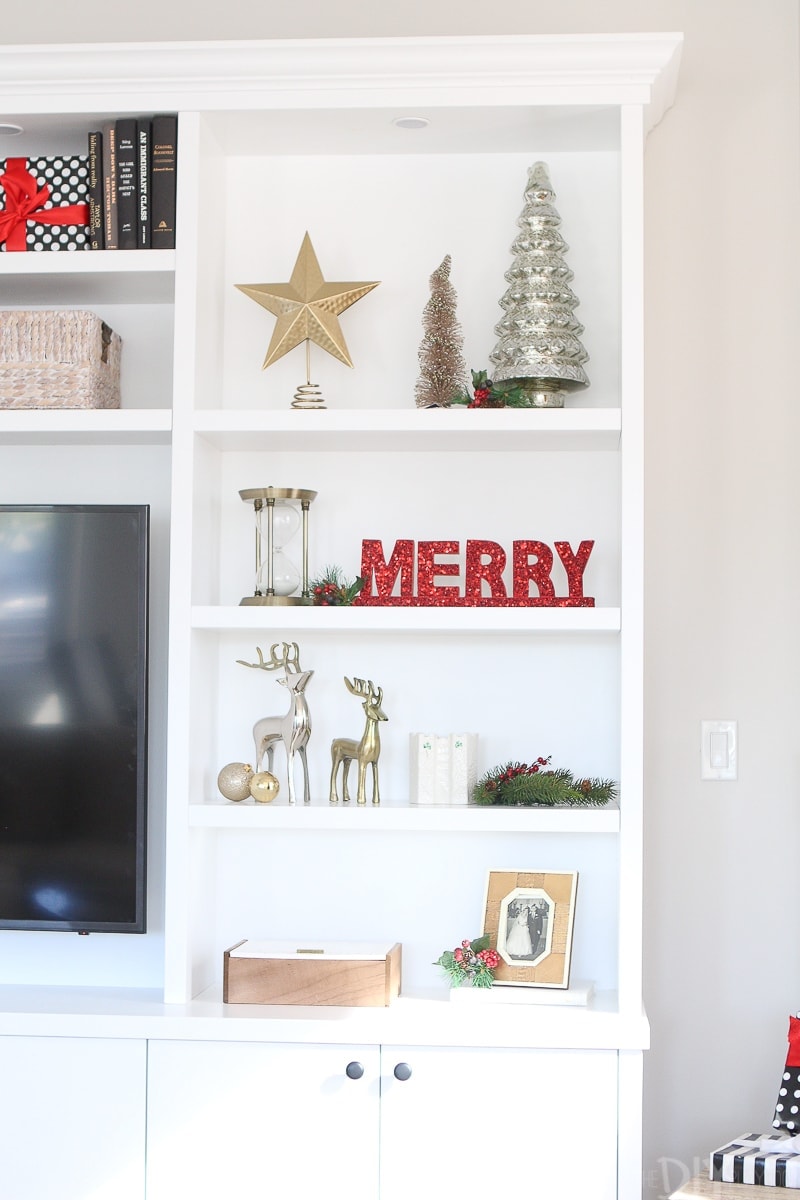 Add ornaments to your shelves for holiday decorating on a budget