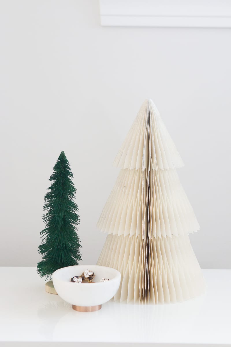 a foldable tree that makes packing old decorations so easy