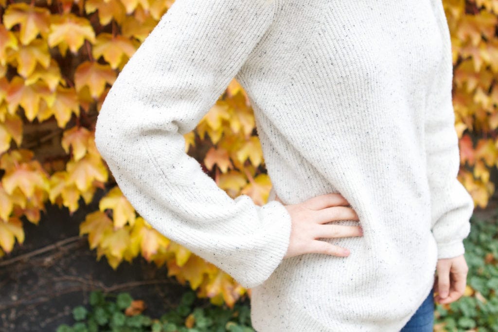 Bell sleeves on this neutral and cozy sweater