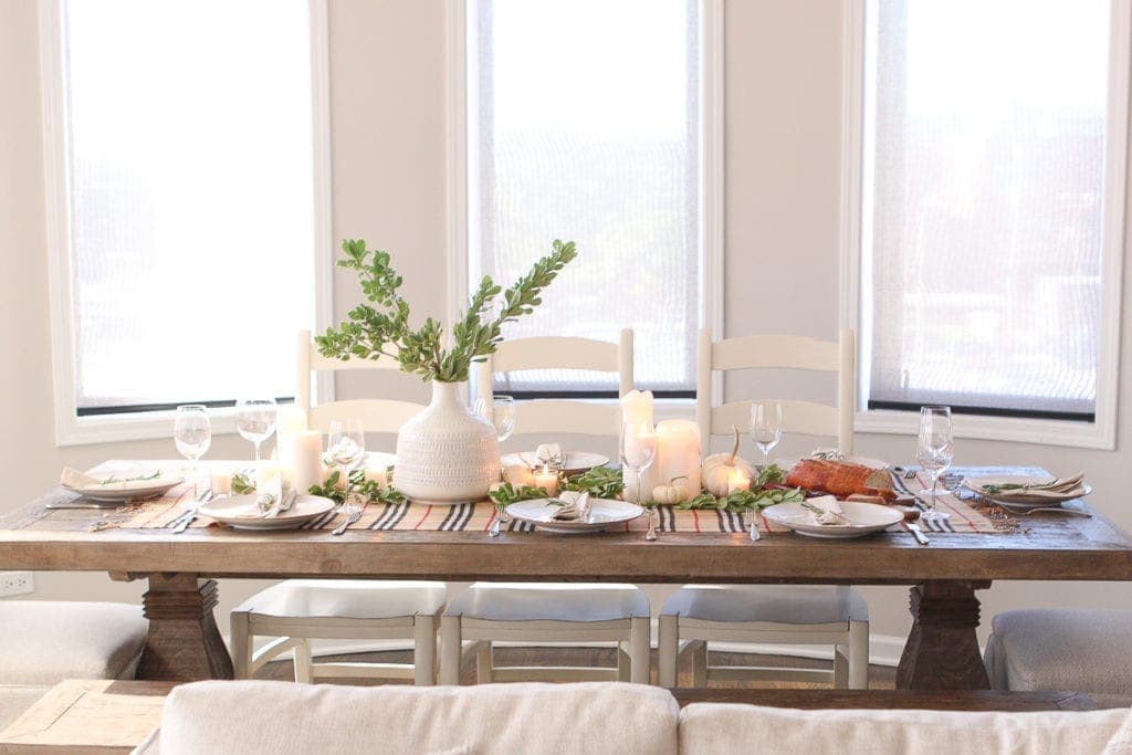 A neutral Thanksgiving tablescape ready the holiday