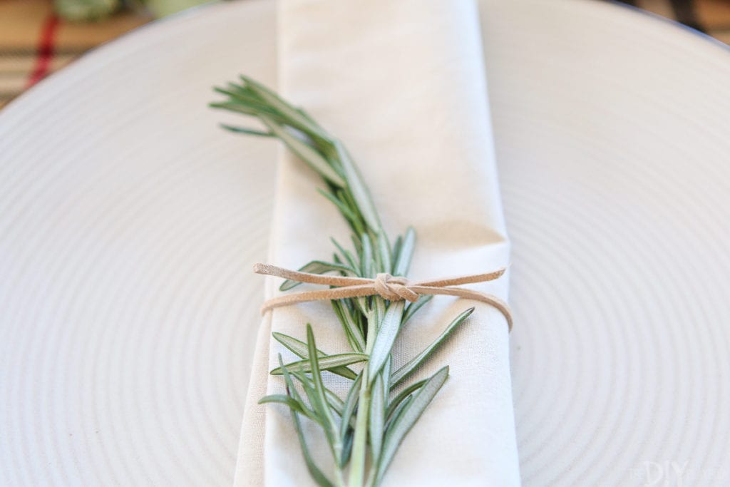 Tuck a sprig of rosemary into the napkins