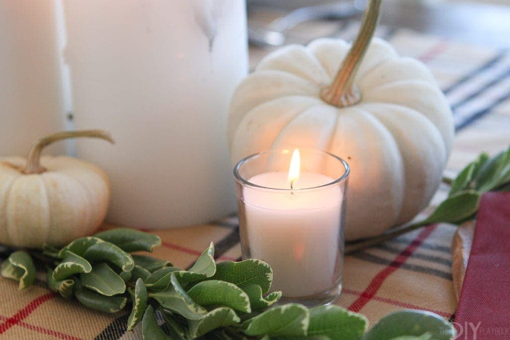 Add small candle votives to the simple Thanksgiving tablescape