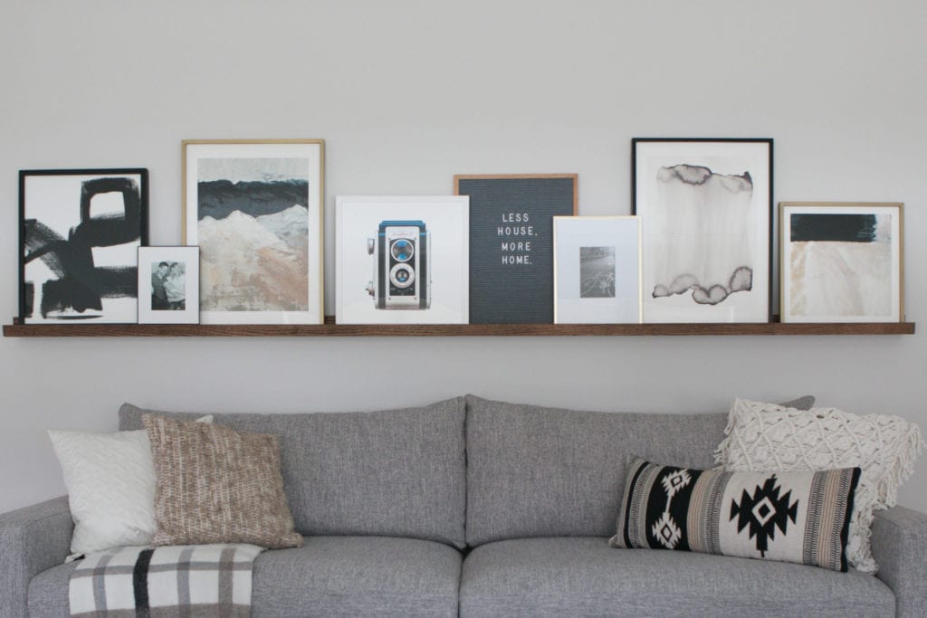 Build a DIY picture ledge for above your couch